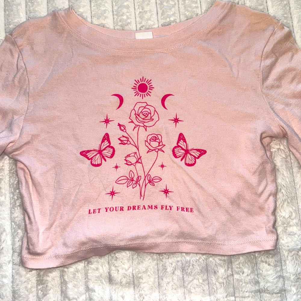Pink shirt with graphics on it! It’s also from a collection from pink !